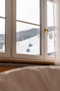 Postel nebo postele na pokoji v ubytování Hotel Christoph