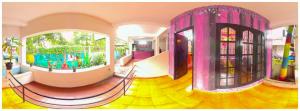 a room with a play room with a mural on the wall at Santa Maria Hostel Kovalam in Kovalam
