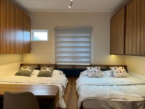 Spaces by Mono Unit 326客房内的一张或多张床位