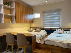 Spaces by Mono Unit 326客房内的一张或多张床位