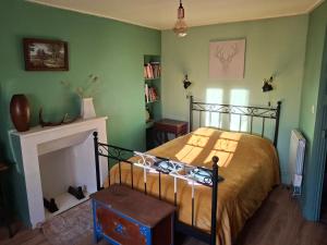 Posteľ alebo postele v izbe v ubytovaní Charmant appartement au cœur des volcans d Auvergne