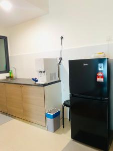 A cozinha ou kitchenette de KaiSplash Splashmania Gamuda Cove
