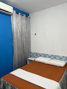 Postel nebo postele na pokoji v ubytování Calango Hostel