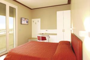 Posteľ alebo postele v izbe v ubytovaní Hotel Dal Ponte