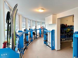 a room with skis on display in a store at Apartmán Orech in Belá