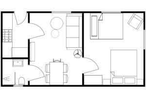 a black and white floor plan of a house at Familien Glück in Gleisweiler