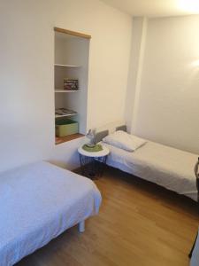 Llit o llits en una habitació de Maison Comet