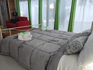 Postel nebo postele na pokoji v ubytování Villa Irma guest house