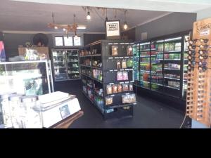 a grocery store with a lot of products on display at 122 Shearwater - Nora's Place in Sedgefield