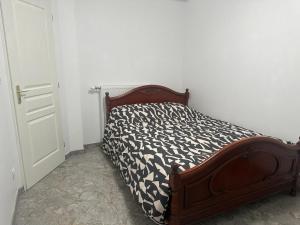Postel nebo postele na pokoji v ubytování Maison type appartement RDC