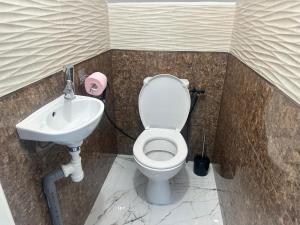 Koupelna v ubytování Maison type appartement RDC