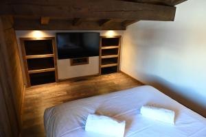 Posteľ alebo postele v izbe v ubytovaní Chalet Montana