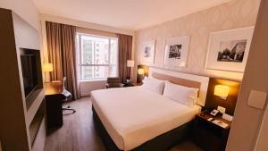 Cama ou camas em um quarto em Holiday Inn Belo Horizonte Savassi by IHG