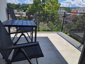 Un balcón o terraza en Apartman SNEG