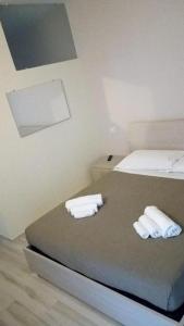 Postel nebo postele na pokoji v ubytování NelBlu B&B