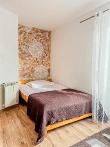 Posteľ alebo postele v izbe v ubytovaní Willa Konda - bania , sauna