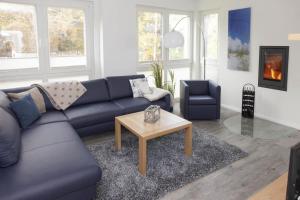 Ein Sitzbereich in der Unterkunft Strandvilla Baabe 10 HERZMUSCHEL