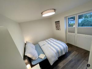 En eller flere senge i et værelse på Neue Liebe Haffkrug 3