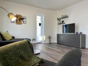 TV a/nebo společenská místnost v ubytování Sonnenweg 30