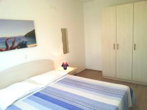 Postel nebo postele na pokoji v ubytování Apartments Levanat