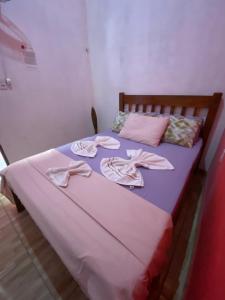 Cama ou camas em um quarto em Pousada House Nativa