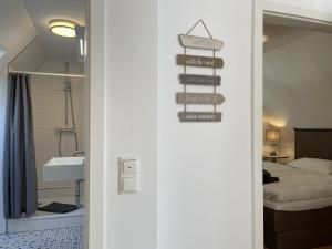 Postel nebo postele na pokoji v ubytování Deichquartier