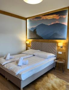 Postel nebo postele na pokoji v ubytování Tatra Widok + 35 fotografií