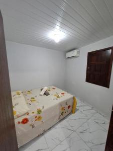 Postel nebo postele na pokoji v ubytování Residência da lagoa