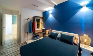 Postel nebo postele na pokoji v ubytování NelBlu B&B