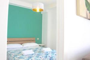 Postel nebo postele na pokoji v ubytování NelBlu B&B