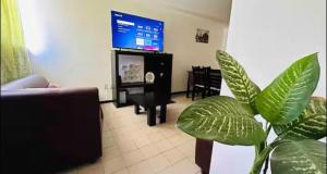 TV a/nebo společenská místnost v ubytování Casa en buen lugar para visitar Puebla y Cholula