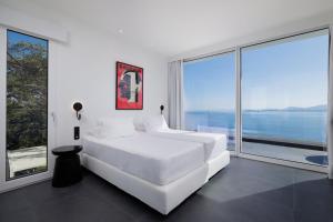 Postel nebo postele na pokoji v ubytování Villa Anax + 36 fotografií