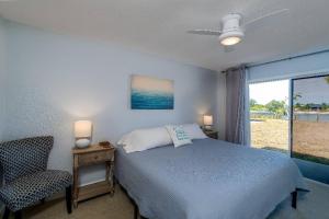 Voodi või voodid majutusasutuse "canal Dreams" 3 Br2 Ba Pool Home On The Canal toas +28 fotot