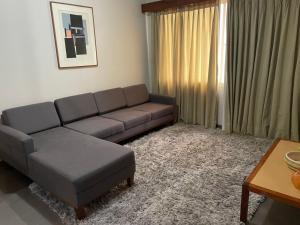 Ein Sitzbereich in der Unterkunft Plaza Flat C/ Serviço De Quarto