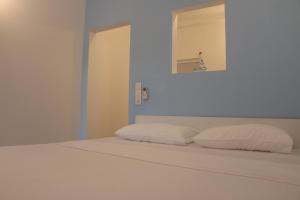 Postel nebo postele na pokoji v ubytování A.V.N HOMESTAY