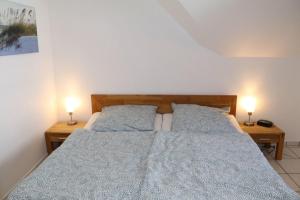 Ένα ή περισσότερα κρεβάτια σε δωμάτιο στο Appartement 12 +3 φωτογραφίες