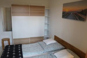 Ένα ή περισσότερα κρεβάτια σε δωμάτιο στο Appartement 6 +6 φωτογραφίες