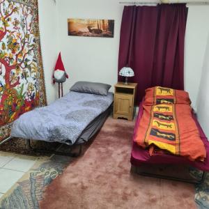 Postel nebo postele na pokoji v ubytování Haus Nummer 7