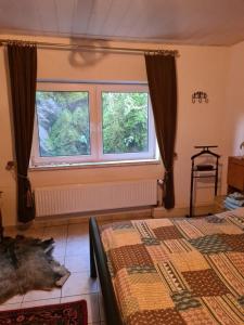 Postel nebo postele na pokoji v ubytování Haus Nummer 7