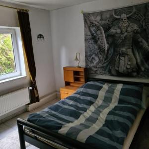 Postel nebo postele na pokoji v ubytování Haus Nummer 7