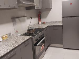 Kuchyň nebo kuchyňský kout v ubytování Oceana Flat