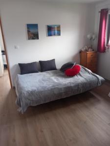 Postel nebo postele na pokoji v ubytování Chez Isabelle