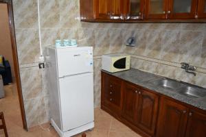Kuchyň nebo kuchyňský kout v ubytování Maison Taha