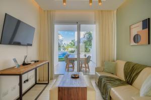 TV/trung tâm giải trí tại Playa Coral | Oasis Frente a la Piscina