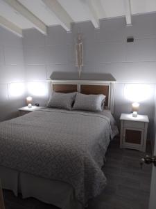 Ένα ή περισσότερα κρεβάτια σε δωμάτιο στο Del bosque 5