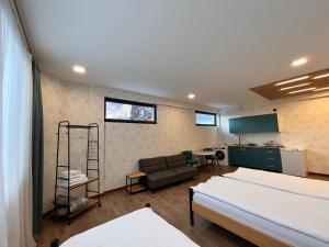 Postel nebo postele na pokoji v ubytování Apart-Hotel Seti