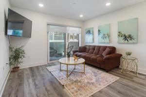 a living room with a couch and a table at Beverly Hills 2BD 2BA with Free Parking in Los Angeles