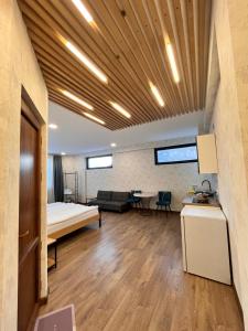 Postel nebo postele na pokoji v ubytování Apart-Hotel Seti