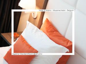 Een bed of bedden in een kamer bij Hotel AL Mulino