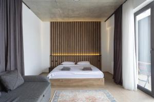 Postel nebo postele na pokoji v ubytování New Gudauri View Hotel